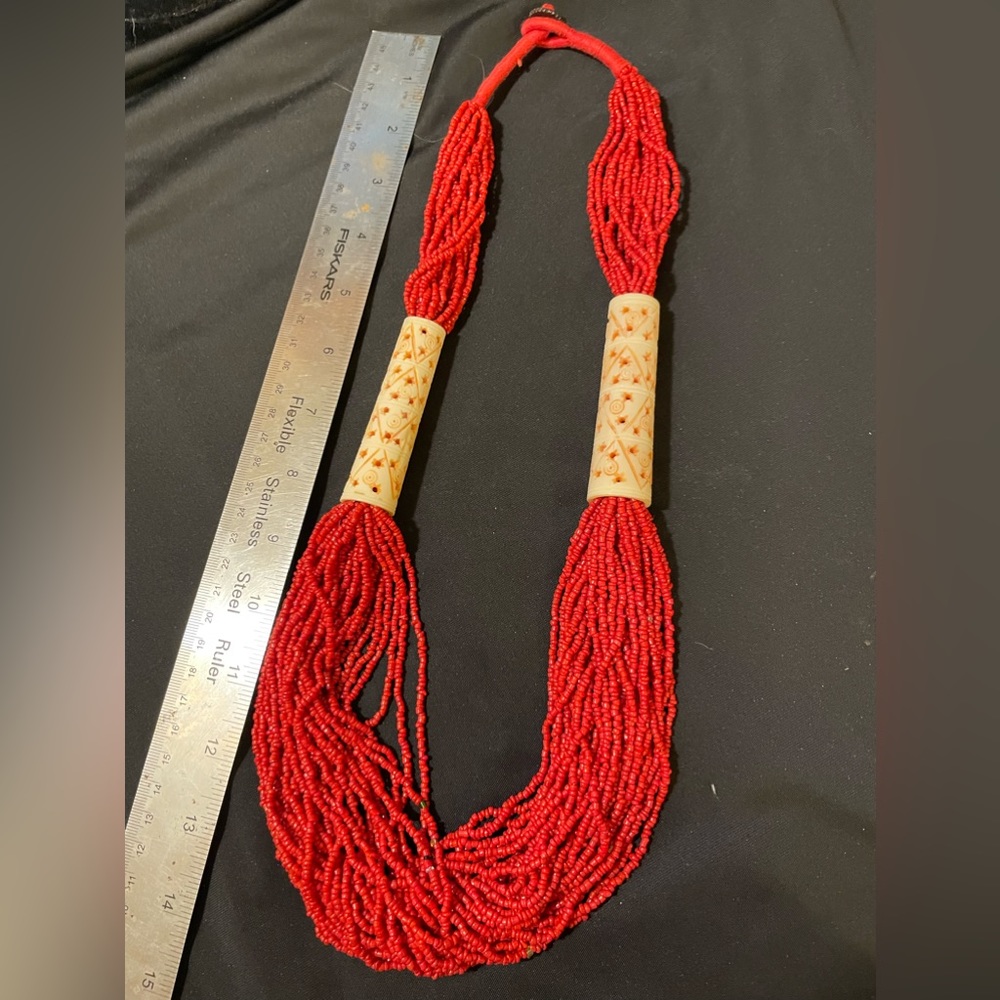 Red seed bead and carved bone necklace
